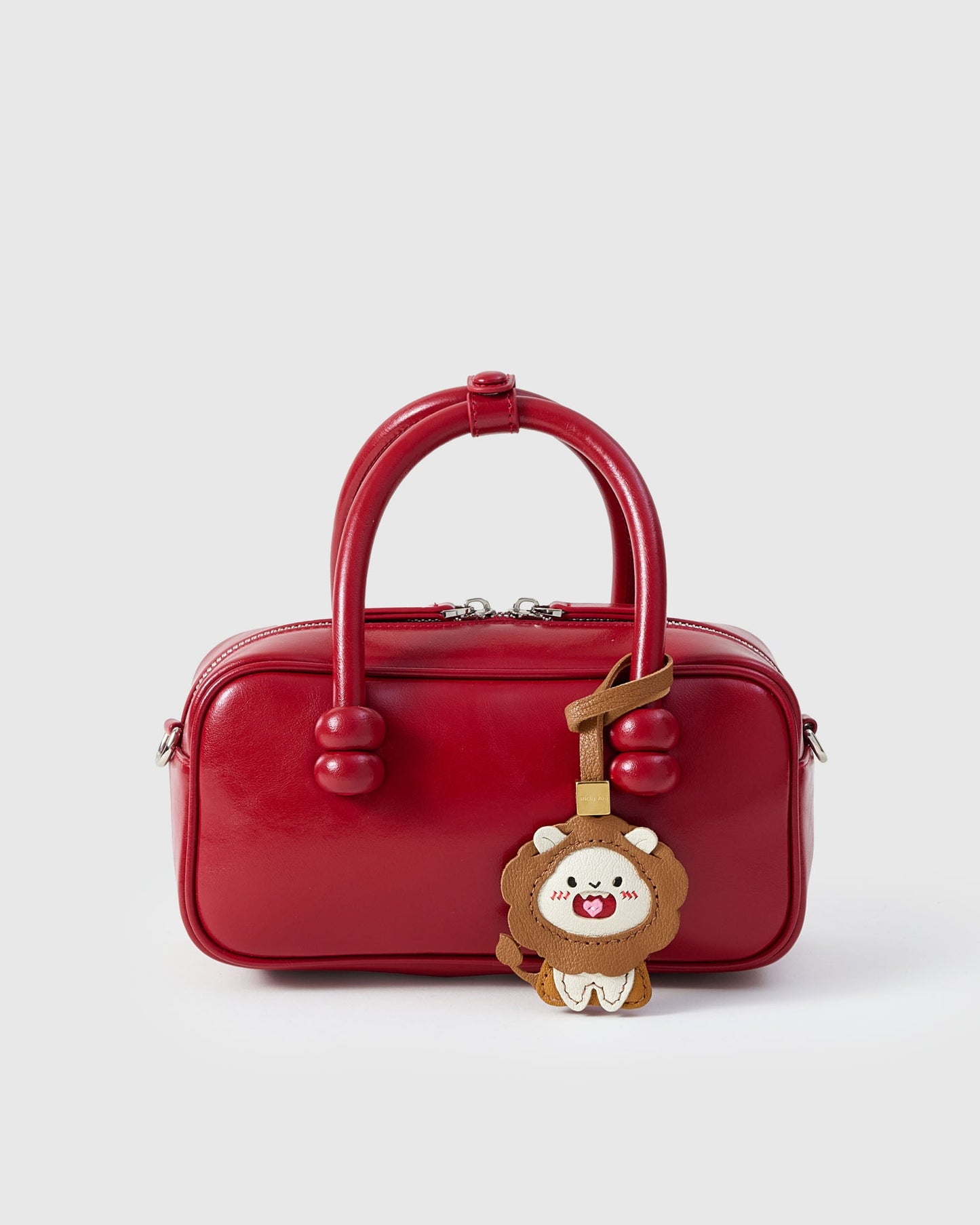 LION CHARM