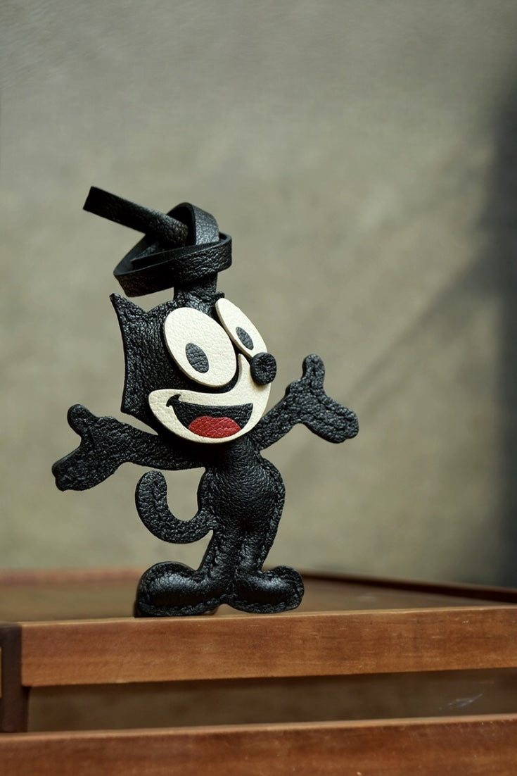 THE CAT CHARM