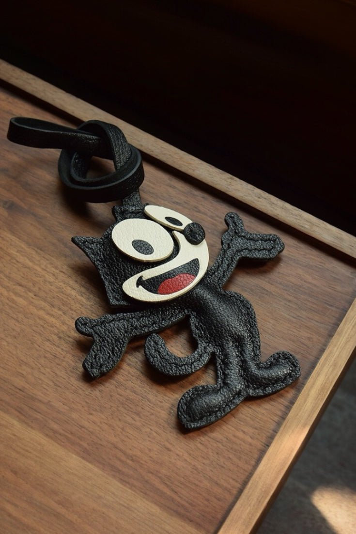 THE CAT CHARM